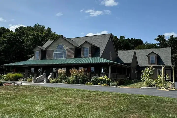 home with new roof by Rosemeyer Roofing LLC